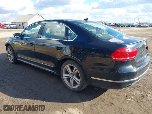 2014 Volkswagen Passat TDI SEL Premium with VIN 1VWCN7A33EC092174, listed as a IAAI auction lot 41690739 with 141,095 mi miles. Bid and sale history available at carsss.com. Image 3.