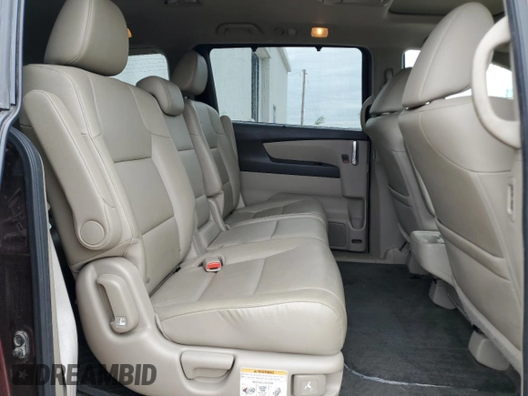 2016 Honda Odyssey Touring Elite with VIN 5FNRL5H9XGB109463, listed as a Copart auction lot 57483225 with 182,450 mi miles and Salvage title. Bid and sale history available at DreamBid. Image 11.