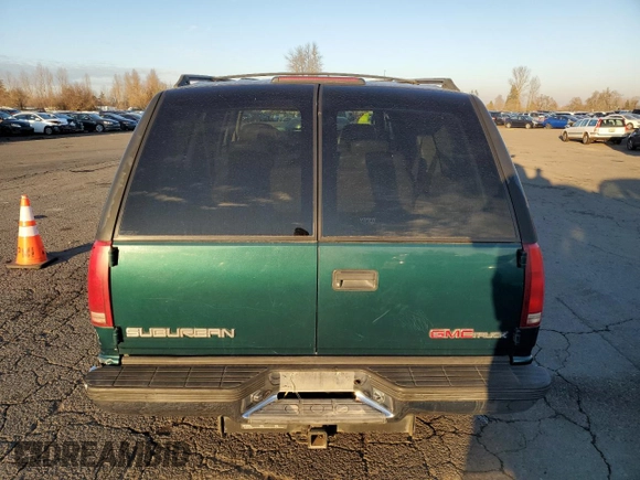 1997 GMC Suburban with VIN 3GKFK16RXVG513571, listed as a Copart auction lot 82086924 with 190,142 mi miles and Salvage title. Bid and sale history available at DreamBid. Image 6.