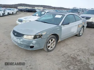 1999 Toyota Solara SE with VIN 2T1CF22P7XC106169, listed as a IAAI auction lot 41291391 with 297,339 mi miles. Bid and sale history available at carsss.com. Image 2.
