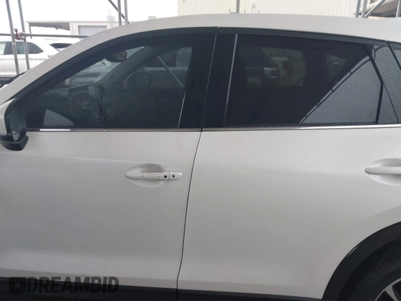 2023 Mazda CX-5 2.5 S Premium Package with VIN JM3KFBDM7P0165562, listed as a IAAI auction lot 41458088 with 35,168 mi miles. Bid and sale history available at carsss.com. Image 14.