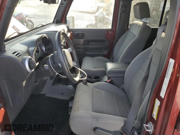 2008 Jeep Wrangler Unlimited Sahara with VIN 1J4GA59128L531922, listed as a Copart auction lot 48982795 with 39,329 mi miles and Clean title. Bid and sale history available at DreamBid. Image 7.