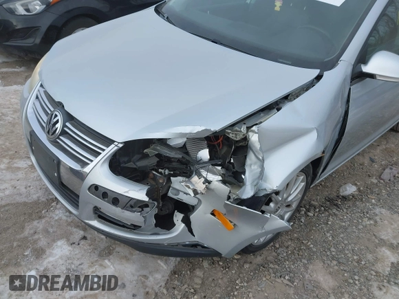 2008 Volkswagen Jetta Wolfsburg Edition with VIN 3VWRJ71K18M185744, listed as a IAAI auction lot 41389714 with 107,446 mi miles and . Bid and sale history available at DreamBid. Image 6.
