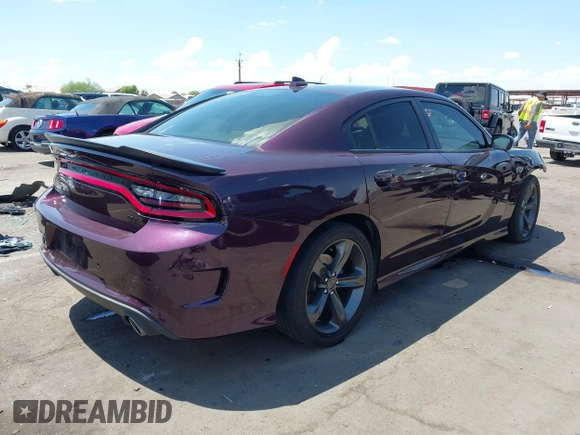 2021 Dodge Charger R/T with VIN 2C3CDXCT2MH574377, listed as a IAAI auction lot 42760667 with 49,295 mi miles and . Bid and sale history available at DreamBid. Image 4.