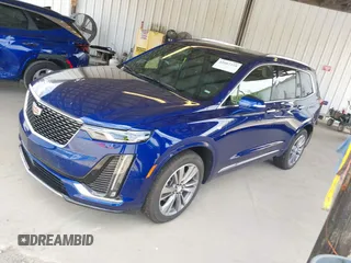 2025 Cadillac XT6 FWD Premium Luxury with VIN 1GYKPCRS5SZ119357, listed as a IAAI auction lot 42087218 with 11,352 mi miles. Bid and sale history available at carsss.com. Image 20.