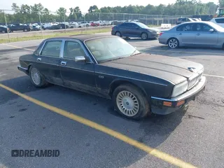 1991 Jaguar XJ with VIN SAJHY1747MC647172, listed as a IAAI auction lot 42714107 with Not provided miles and . Bid and sale history available at DreamBid. Image 1.