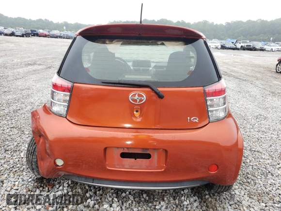2012 Scion iQ with VIN JTNJJXB07CJ017816, listed as a Copart auction lot 59616355 with 141,384 mi miles and Salvage title. Bid and sale history available at DreamBid. Image 6.