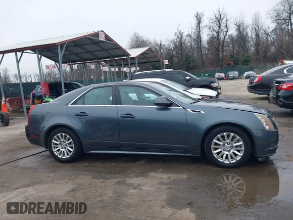 2011 Cadillac CTS Sedan Luxury with VIN 1G6DG5EY7B0163601, listed as a IAAI auction lot 41536256 with 106,523 mi miles. Bid and sale history available at carsss.com. Image 13.