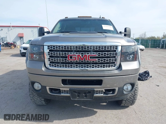 2013 GMC Sierra 2500HD Denali z VIN 1GT125E81DF127112, wystawiony jako IAAI lot #41907764 z przebiegiem 289 619 mil mil oraz . Historia ofert i sprzedaży dostępna na DreamBid. Obrazek 6.