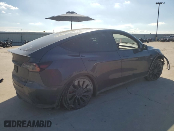 2022 Tesla Model Y Performance with VIN 7SAYGDEF8NF384270, listed as a Copart auction lot 56718215 with Not provided miles and Salvage title. Bid and sale history available at DreamBid. Image 3.
