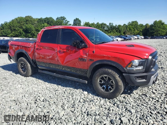 2017 Ram 1500 Rebel with VIN 1C6RR7YT2HS674131, listed as a Copart auction lot 61403835 with 24,675 mi miles and Salvage title. Bid and sale history available at DreamBid. Image 4.