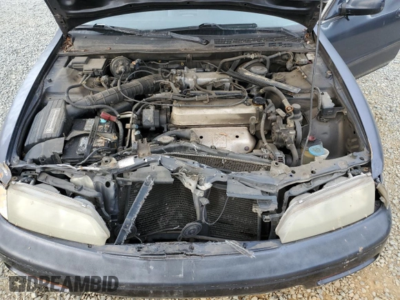 1995 Honda Accord LX with VIN 1HGCD5630SA032204, listed as a Copart auction lot 79454934 with 52,291 mi miles and Salvage Title. Bid and sale history available at DreamBid. Image 12.