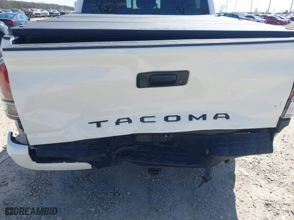 2023 Toyota Tacoma 4WD SR with VIN 3TMCZ5AN8PM647523, listed as a IAAI auction lot 41887896 with 17,864 mi miles. Bid and sale history available at carsss.com. Image 19.