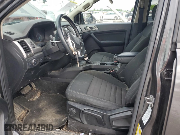 2019 Ford Ranger XL with VIN 1FTER4FH7KLB21853, listed as a Copart auction lot 54586515 with 97,758 mi miles and Salvage title. Bid and sale history available at DreamBid. Image 7.