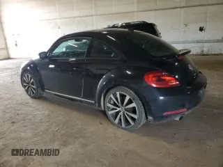 2012 Volkswagen Beetle Turbo with VIN 3VWVA7AT3CM630324, listed as a Copart auction lot 55436855 with 223,015 mi miles and Clean Title. Bid and sale history available at DreamBid. Image 2.