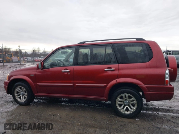 2004 Suzuki XL7 LX z VIN JS3TX92V444102973, wystawiony jako IAAI lot #41708405 z przebiegiem 144 581 mil mil oraz . Historia ofert i sprzedaży dostępna na DreamBid. Obrazek 15.