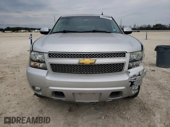 2014 Chevrolet Suburban LT with VIN 1GNSCJE07ER160935, listed as a Copart auction lot 46928335 with 123,811 mi miles and Salvage Title. Bid and sale history available at carsss.com. Image 5.