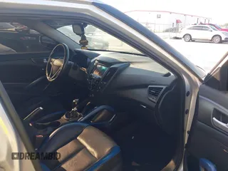 2013 Hyundai Veloster Turbo with VIN KMHTC6AE5DU112756, listed as a IAAI auction lot 42854505 with 99,015 mi miles and . Bid and sale history available at DreamBid. Image 5.
