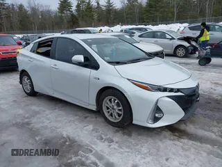 2021 Toyota Prius LE z VIN JTDKAMFP5M3181120, wystawiony jako IAAI lot #41623588 z przebiegiem 83 809 mil mil oraz . Historia ofert i sprzedaży dostępna na DreamBid. Obrazek 1.