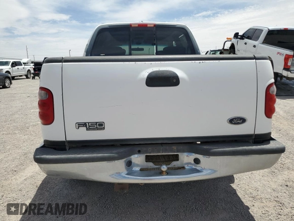 2001 Ford F-150 XLT with VIN 1FTRW07W41KA62569, listed as a Copart auction lot 56783475 with 222,630 mi miles and Clean title. Bid and sale history available at DreamBid. Image 6.