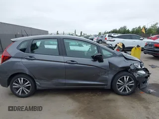 2018 Honda Fit EX with VIN 3HGGK5H85JM704873, listed as a IAAI auction lot 42421049 with 58,481 mi miles and . Bid and sale history available at DreamBid. Image 14.