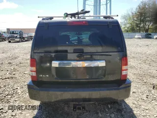 2011 Jeep Liberty Sport Jet z VIN 1J4PN2GK4BW558575, wystawiony jako Copart lot #55954565 z przebiegiem Nie podano mil oraz Szkoda całkowita • Salvage title. Historia ofert i sprzedaży dostępna na DreamBid. Obrazek 6.