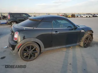 2013 MINI Coupe S z VIN WMWSX3C57DT408719, wystawiony jako Copart lot #75440574 z przebiegiem Nie podano mil oraz Szkody całkowita. Historia ofert i sprzedaży dostępna na DreamBid. Obrazek 3.
