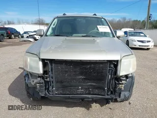 2010 Mercury Mariner Premier with VIN 4M2CN8HG4AKJ05736, listed as a IAAI auction lot 41744987 with 209,819 mi miles and . Bid and sale history available at DreamBid. Image 13.