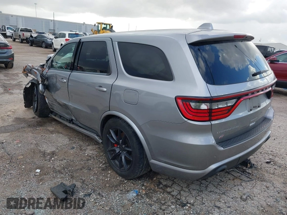 2018 Dodge Durango SRT with VIN 1C4SDJGJ5JC256006, listed as a IAAI auction lot 41038356 with 71,385 mi miles and . Bid and sale history available at DreamBid. Image 3.