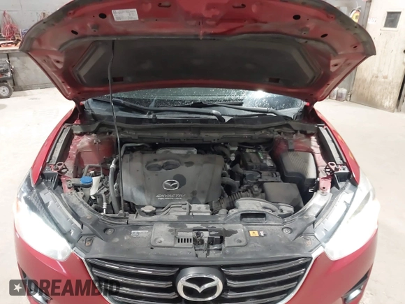 2016 Mazda CX-5 Grand Touring with VIN JM3KE4DY6G0690923, listed as a IAAI auction lot 41875553 with 179,489 mi miles. Bid and sale history available at carsss.com. Image 10.