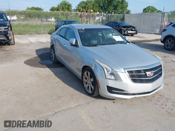 2015 Cadillac ATS Luxury RWD z VIN 1G6AB5RA6F0127029, wystawiony jako IAAI lot #42376359 z przebiegiem 131 823 mil mil oraz . Historia ofert i sprzedaży dostępna na DreamBid. Obrazek 1.