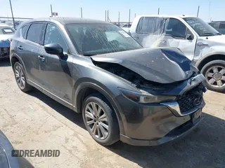 2023 Mazda CX-5 Signature with VIN JM3KFBXY8P0101156, listed as a IAAI auction lot 41670424 with Not Provided miles and . Bid and sale history available at carsss.com. Image 1.