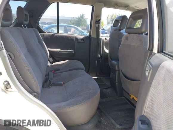 1999 Isuzu Rodeo S z VIN 4S2CM58WXX4347611, wystawiony jako IAAI lot #42351641 z przebiegiem 256 007 mil mil oraz . Historia ofert i sprzedaży dostępna na DreamBid. Obrazek 8.