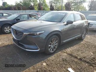 2018 Mazda CX-9 Grand Touring z VIN JM3TCBDY9J0217510, wystawiony jako Copart lot #58531785 z przebiegiem 131 021 mil mil oraz Szkoda całkowita • Salvage title. Historia ofert i sprzedaży dostępna na DreamBid. Obrazek 1.
