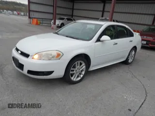 2013 Chevrolet Impala LTZ with VIN 2G1WC5E37D1223897, listed as a IAAI auction lot 41950823 with 165,237 mi miles and . Bid and sale history available at DreamBid. Image 2.