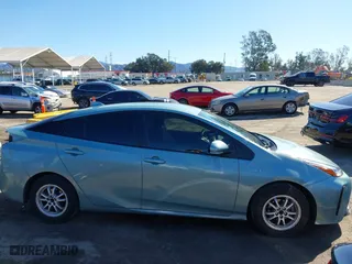 2022 Toyota Prius L Eco with VIN JTDKAMFU3N3187053, listed as a IAAI auction lot 41741417 with 152,444 mi miles. Bid and sale history available at carsss.com. Image 14.