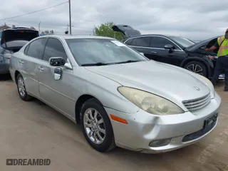 2003 Lexus ES 300 with VIN JTHBF30G736004651, listed as a IAAI auction lot 42082023 with 221,653 mi miles. Bid and sale history available at carsss.com. Image 1.