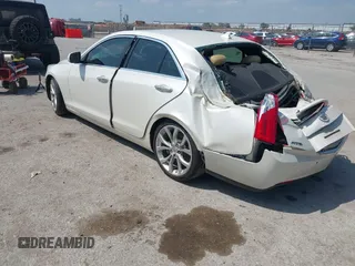 2013 Cadillac ATS Premium z VIN 1G6AE5S35D0129175, wystawiony jako IAAI lot #42037872 z przebiegiem 95 747 mil mil oraz . Historia ofert i sprzedaży dostępna na DreamBid. Obrazek 3.