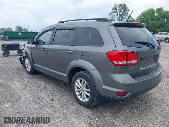 2013 Dodge Journey SXT with VIN 3C4PDCBG8DT517733, listed as a IAAI auction lot 42737063 with 67,363 mi miles and . Bid and sale history available at DreamBid. Image 3.