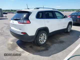 2019 Jeep Cherokee Latitude with VIN 1C4PJMCB6KD284293, listed as a IAAI auction lot 42597573 with 112,301 mi miles and . Bid and sale history available at DreamBid. Image 4.