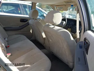 1998 Toyota Avalon XL with VIN 4T1BF18B0WU218570, listed as a IAAI auction lot 41790708 with 103,906 mi miles and . Bid and sale history available at DreamBid. Image 8.