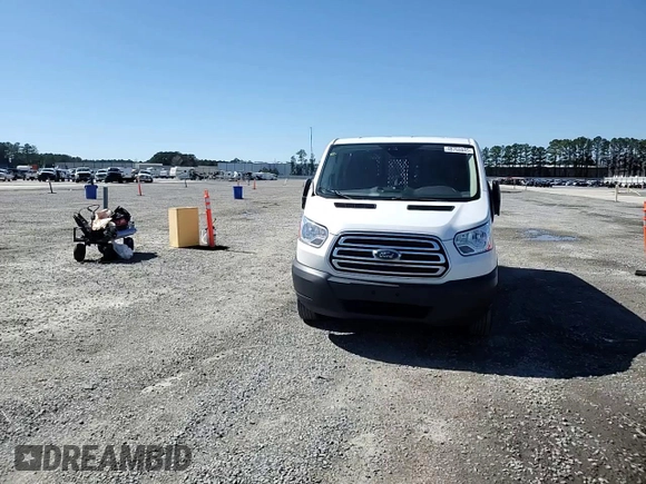 2019 Ford Transit z VIN 1FTYR1ZM9KKB51799, wystawiony jako Copart lot #48765045 z przebiegiem 261 954 mil mil oraz Szkoda całkowita • Salvage title. Historia ofert i sprzedaży dostępna na DreamBid. Obrazek 12.
