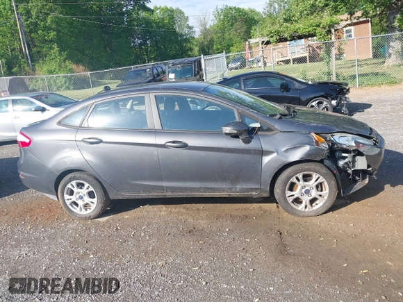 2016 Ford Fiesta SE z VIN 3FADP4BJ8GM184675, wystawiony jako IAAI lot #42169234 z przebiegiem 54 231 mil mil oraz . Historia ofert i sprzedaży dostępna na DreamBid. Obrazek 14.