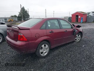 2007 Ford Focus S with VIN 1FAHP34N57W187755, listed as a IAAI auction lot 41839701 with Not Provided miles and . Bid and sale history available at carsss.com. Image 4.