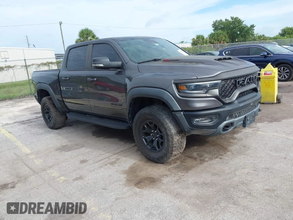 2021 Ram 1500 TRX with VIN 1C6SRFU98MN820577, listed as a IAAI auction lot 42652005 with 43,429 mi miles and . Bid and sale history available at DreamBid. Image 1.