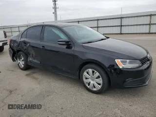 2014 Volkswagen Jetta SE with VIN 3VWD17AJ2EM381057, listed as a Copart auction lot 54267475 with 187,770 mi miles and Salvage title. Bid and sale history available at DreamBid. Image 4.