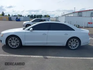 2015 Audi A8 4.0T with VIN WAU32AFD6FN039739, listed as a IAAI auction lot 41946401 with 102,668 mi miles and . Bid and sale history available at DreamBid. Image 14.
