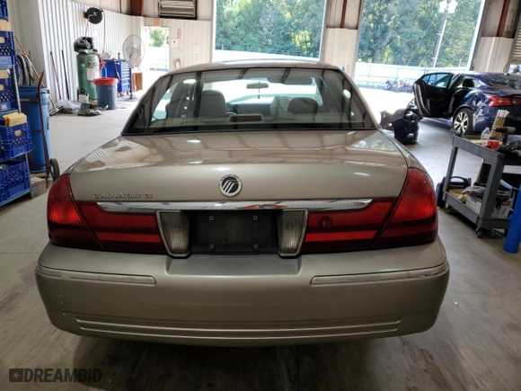 2003 Mercury Grand Marquis GS Convenience with VIN 2MEFM74W43X706057, listed as a Copart auction lot 65842884 with 215,829 mi miles and Salvage Title. Bid and sale history available at carsss.com. Image 6.
