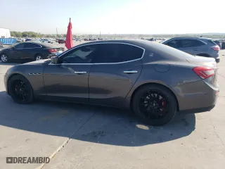2014 Maserati Ghibli S Q4 with VIN ZAM57RTA7E1085782, listed as a Copart auction lot 75537634 with 111,616 mi miles and Salvage Title. Bid and sale history available at carsss.com. Image 2.