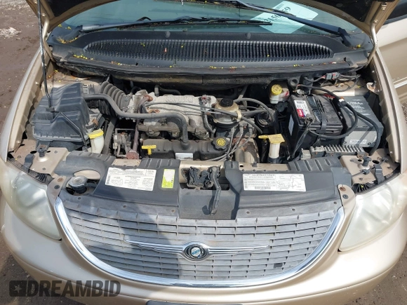 2001 Chrysler Town & Country LXi with VIN 2C8GP54L81R374793, listed as a IAAI auction lot 42150259 with 134,591 mi miles and . Bid and sale history available at DreamBid. Image 10.